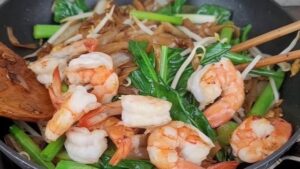 Adding Sprout Gai Lan And Shrimps