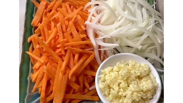 Sliced Onion, Carrots And Minced Garlic