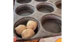 Keep The Dough Balls In The Muffin Tin Like This