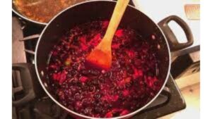 Blueberry Ghost Pepper Hot Sauce Ingredients Simmering